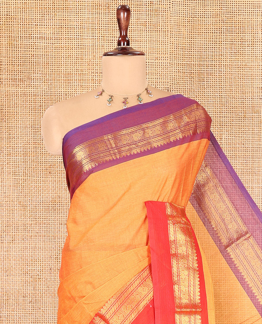 Mustard Plain Chettinad Cotton Saree, a Contrast Kal Eragina Traditional Ganga-Jamuna Border, Striped Pallu, and a Matching Blouse