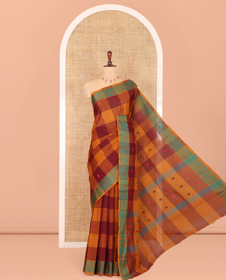 Mustard-Wine Checked Chettinad Cotton Saree, Subtly Woven with Buttas, a Subtle Floral-Chakram Border, and a Matching Blouse
