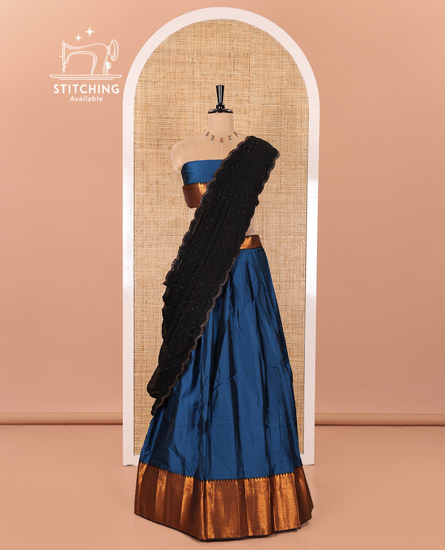 Blue Taffeta Silk Half-Saree Featuring a Plain Skirt, Complemented by a Contrast Traditional Zari Design Border, Paired with a Matching Blouse, and a Georgette Scallop-Bordered Stone Work Dhavani