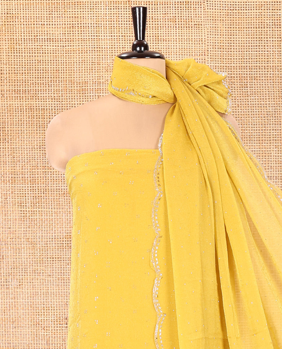 Yellow Moss Organza Material Churidar Set, Embellished with Floral Embroidery and Stone Struck on Its Top, a Plain Santoon Bottom, and Paired with a Moss Organza Stone Work Scallop Dupatta