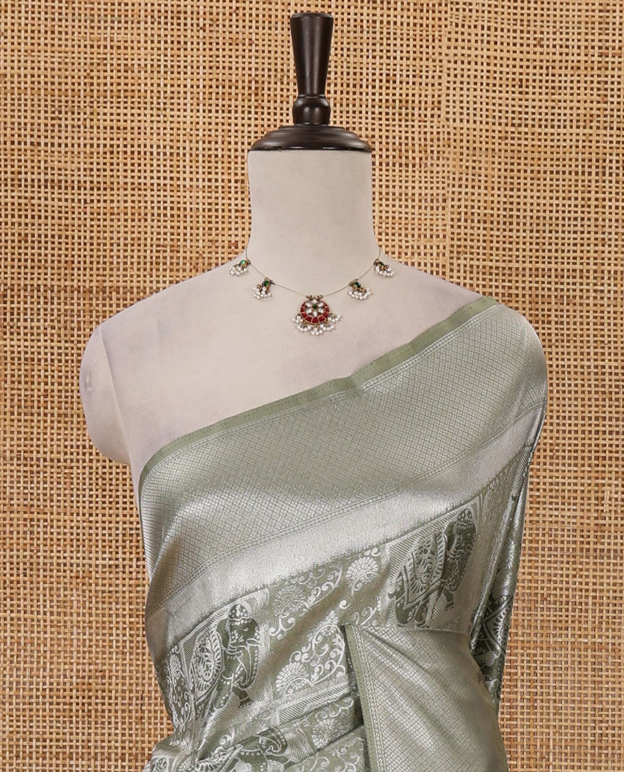 Green floral & elephant jacquard softy saree, diamond design zari border, intricate pallu & matching jacquard blouse