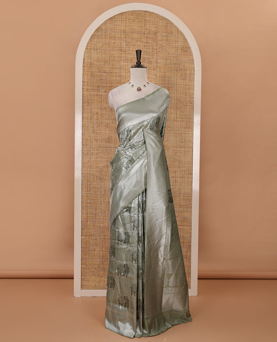 Green floral & elephant jacquard softy saree, diamond design zari border, intricate pallu & matching jacquard blouse