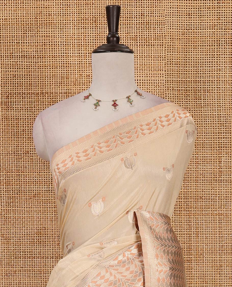Half-white leaf zari buttas dola silk saree, geometric patterned zari border, pallu of geometric pattern & diagonal stripes & plain blouse