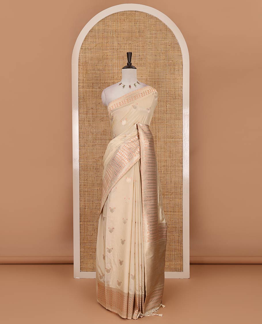 Half-white leaf zari buttas dola silk saree, geometric patterned zari border, pallu of geometric pattern & diagonal stripes & plain blouse