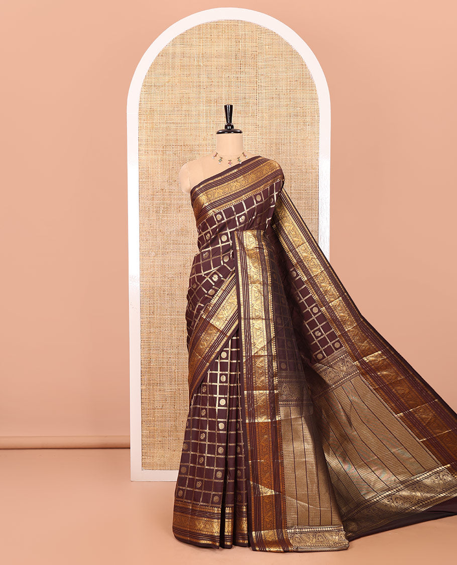 Coffee Brown Kanchipuram Budget Silk Saree Adorned with Peacock and Chakram Enclosed Checks, Highlighted with Varisai Pettu Border of Peacock Designs, Grandly Embellished Zari Pallu of Geometric Designs, and Paired with a Matching Blouse