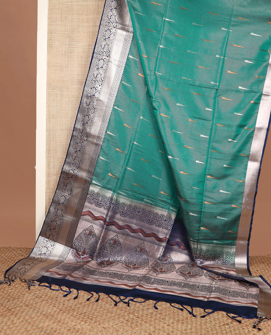 Green zari stripes, and rekku buttas soft silk saree, contrast traditional zari border, and intricate pallu