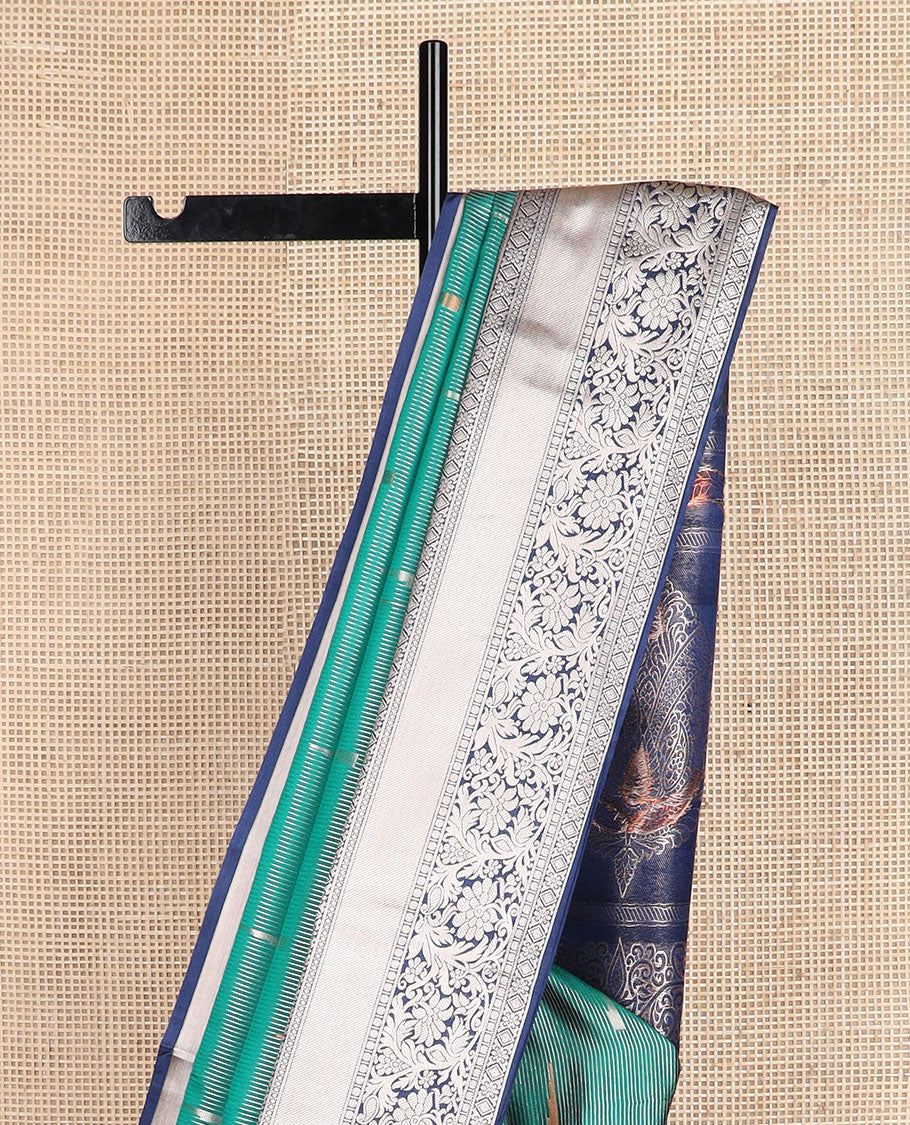 Green zari stripes, and rekku buttas soft silk saree, contrast traditional zari border, and intricate pallu