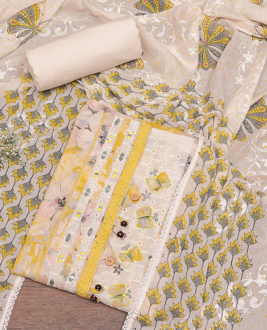 Chikku-Yellow Cotton Material Churidar Set Features Floral Print and Neck Patch Top, Contrast Bottom, and Print-Embroidered Dupatta