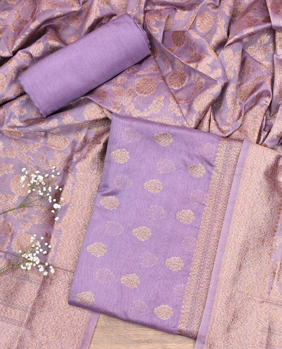 Lavender Material Churidar Set, Sparsely Threaded with Zari Buttas on Its Chanderi Silk Top, a Plain Bottom, and Floral Jaal Dupatta