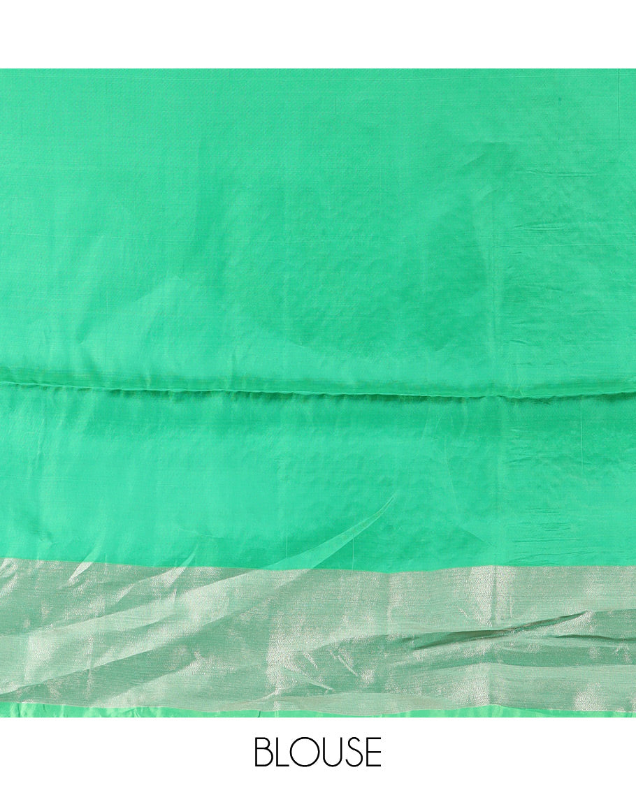Green Semi Uppada Saree Highlighted with Leaf Buttas, Complemented by a Contrasting Border, Pallu Featuring Intricate Zari Designs, and Paired with a Contrast Blouse