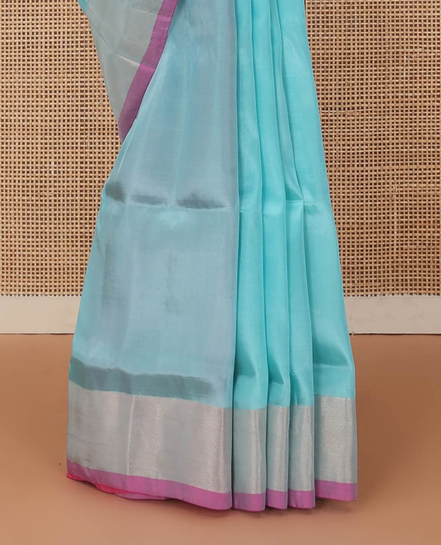 Blue zari buttas Uppada saree, contrast bavanji border, and leaf design pallu