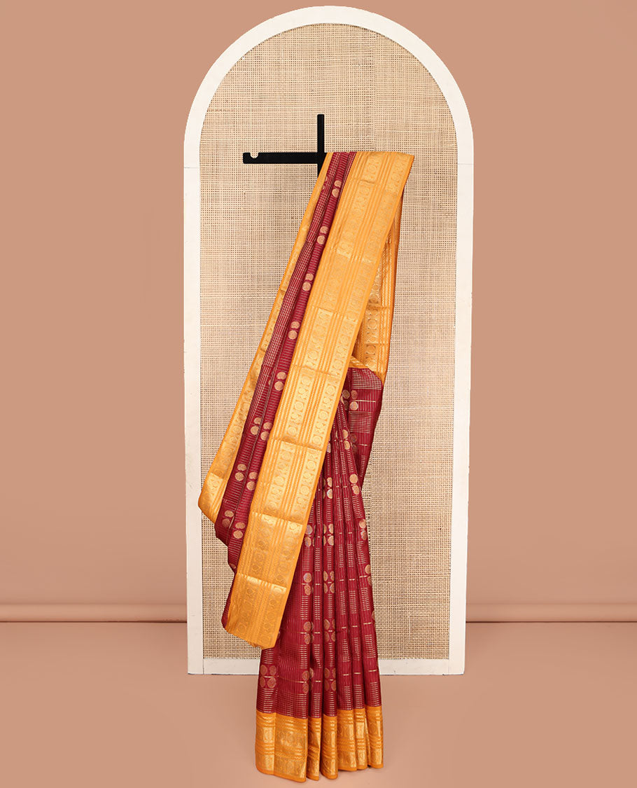 Orange Vasundhara Lite Silk Mix Saree, Majestically Detailed with Zari Butta Enclosed Checked Design on Its Body, Complemented by a Contrast Border of Neli, Kathir, Mayil, and Chakram Designs, Intricately Designed Pallu, and Paired with a Contrast Blouse