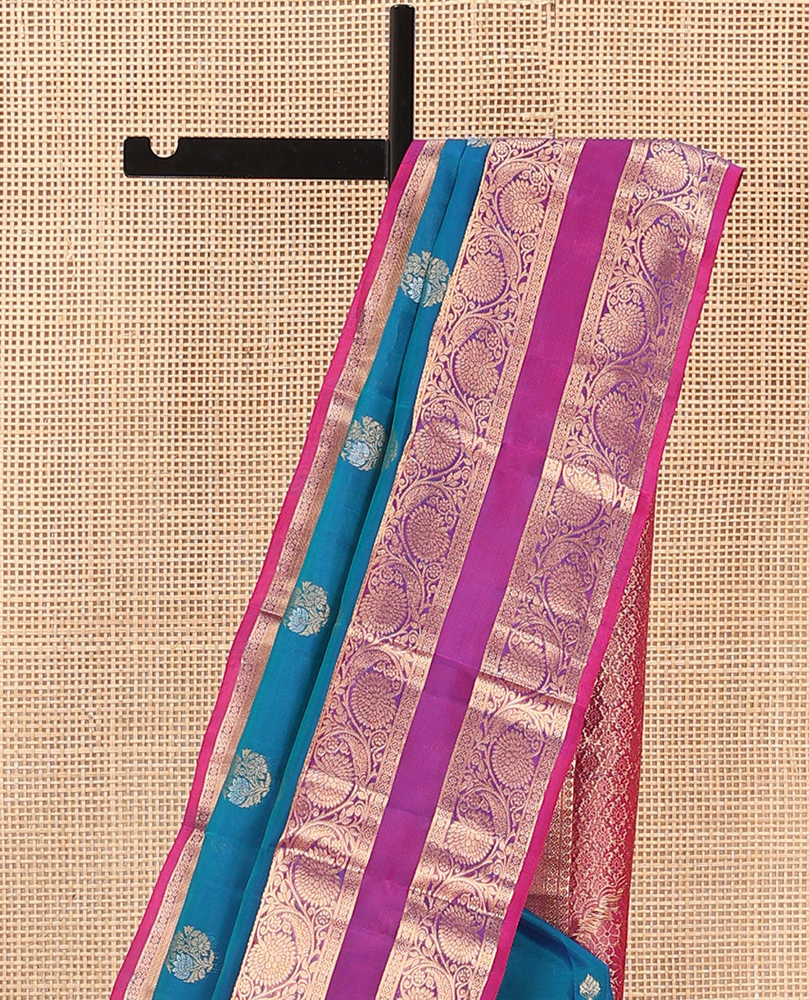 Blue Vasundhara Lite Silk Mix Saree, Prettified with Zari Buttas on Its Body, Complemented by a Contrast Rettai Pettu Border of Thilakam Mokku, and Kodi Visiry Designs, Opulently Embellished Pallu, and Paired with a Contrast Blouse