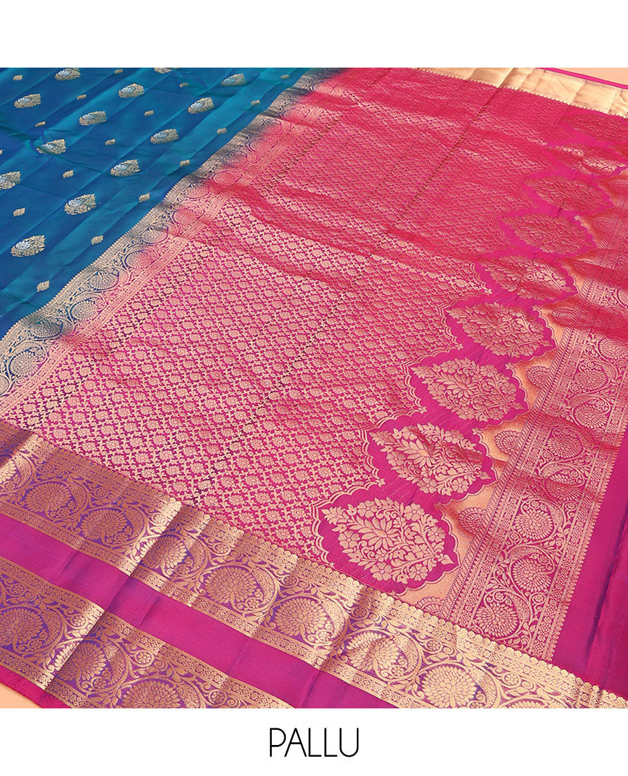 Blue Vasundhara Lite Silk Mix Saree, Prettified with Zari Buttas on Its Body, Complemented by a Contrast Rettai Pettu Border of Thilakam Mokku, and Kodi Visiry Designs, Opulently Embellished Pallu, and Paired with a Contrast Blouse