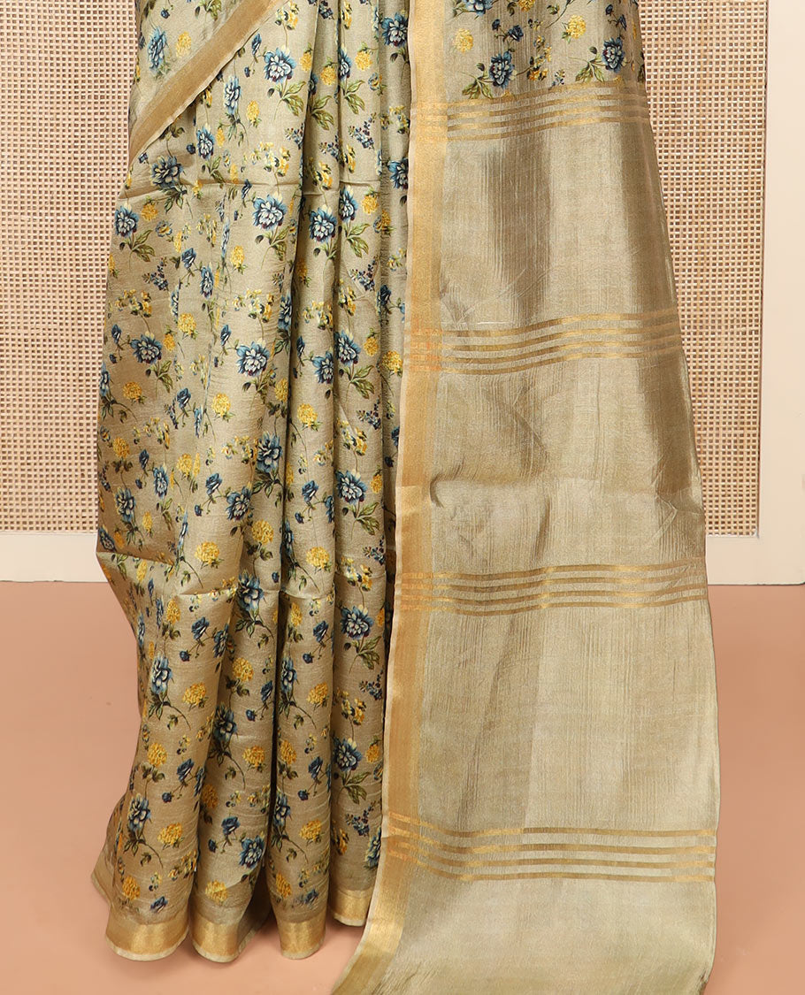 Khaki Banana Pith Saree Prettified with Floral Motifs Digital Print, Subtle Zari Border, Pallu Gleamed Up with Zari Stripes, and Paired with a Contrast Floral Printed Blouse
