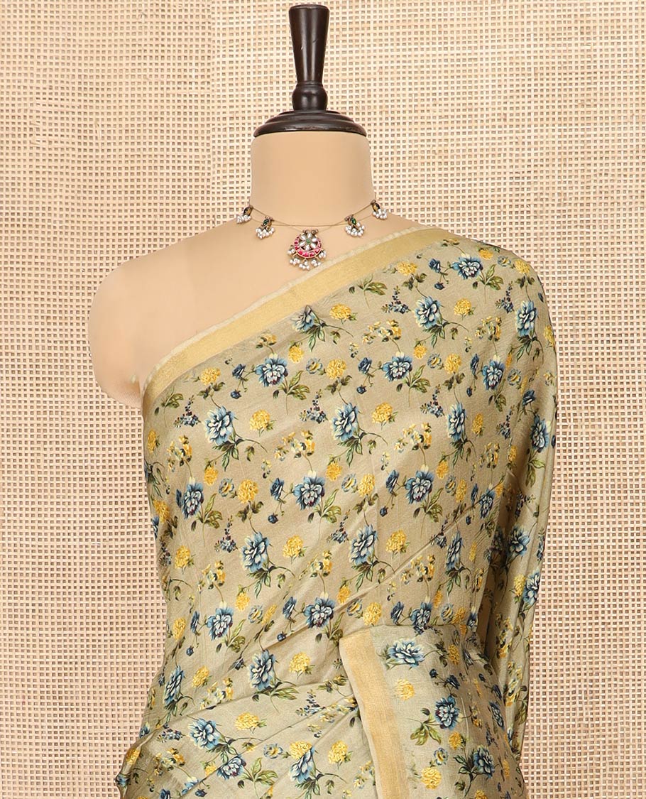Khaki Banana Pith Saree Prettified with Floral Motifs Digital Print, Subtle Zari Border, Pallu Gleamed Up with Zari Stripes, and Paired with a Contrast Floral Printed Blouse