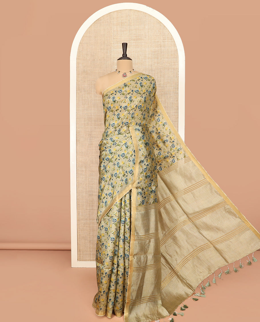 Khaki Banana Pith Saree Prettified with Floral Motifs Digital Print, Subtle Zari Border, Pallu Gleamed Up with Zari Stripes, and Paired with a Contrast Floral Printed Blouse