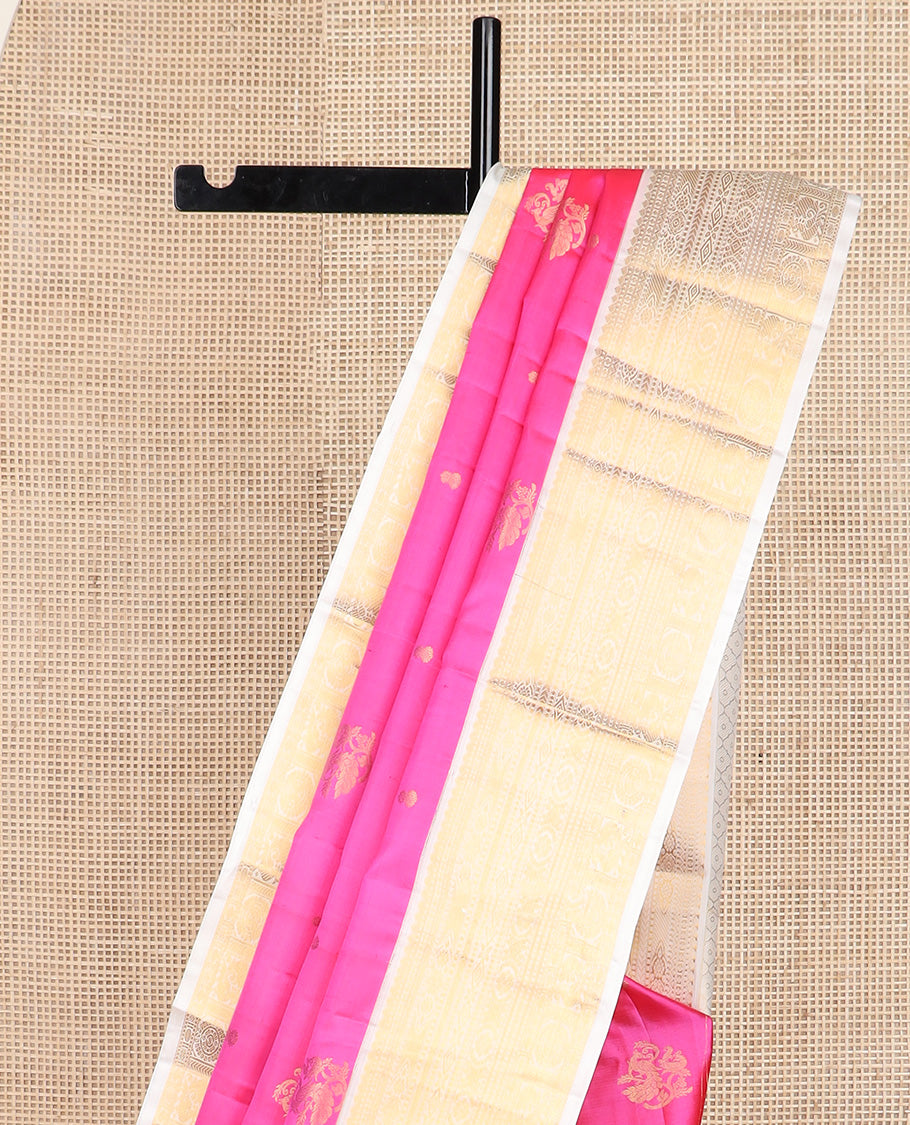 Pink zari buttas silk saree, contrast border of thilakam, diamond, laddu kamalam, muthu, kathir, mayil and chakram designs, and jaal pallu