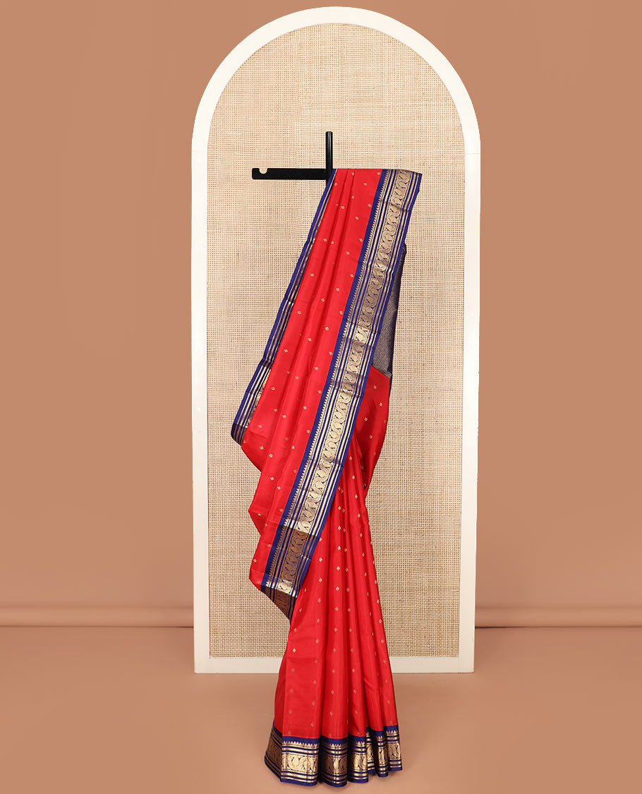 Red Vasundhara Silk Saree Elevated with Zari Buttas, Complemented by a Contrast Border of Thilakam Mokku, Banaras, Kathir, and Manga Designs, Featuring a Pallu of Jaal Designs, and a Contrast Blouse