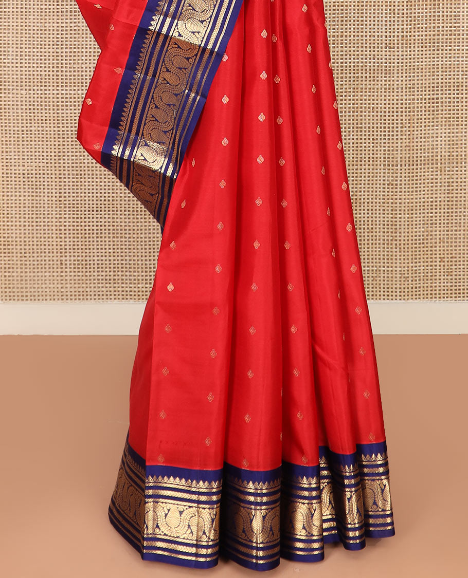Red Vasundhara Silk Saree Elevated with Zari Buttas, Complemented by a Contrast Border of Thilakam Mokku, Banaras, Kathir, and Manga Designs, Featuring a Pallu of Jaal Designs, and a Contrast Blouse