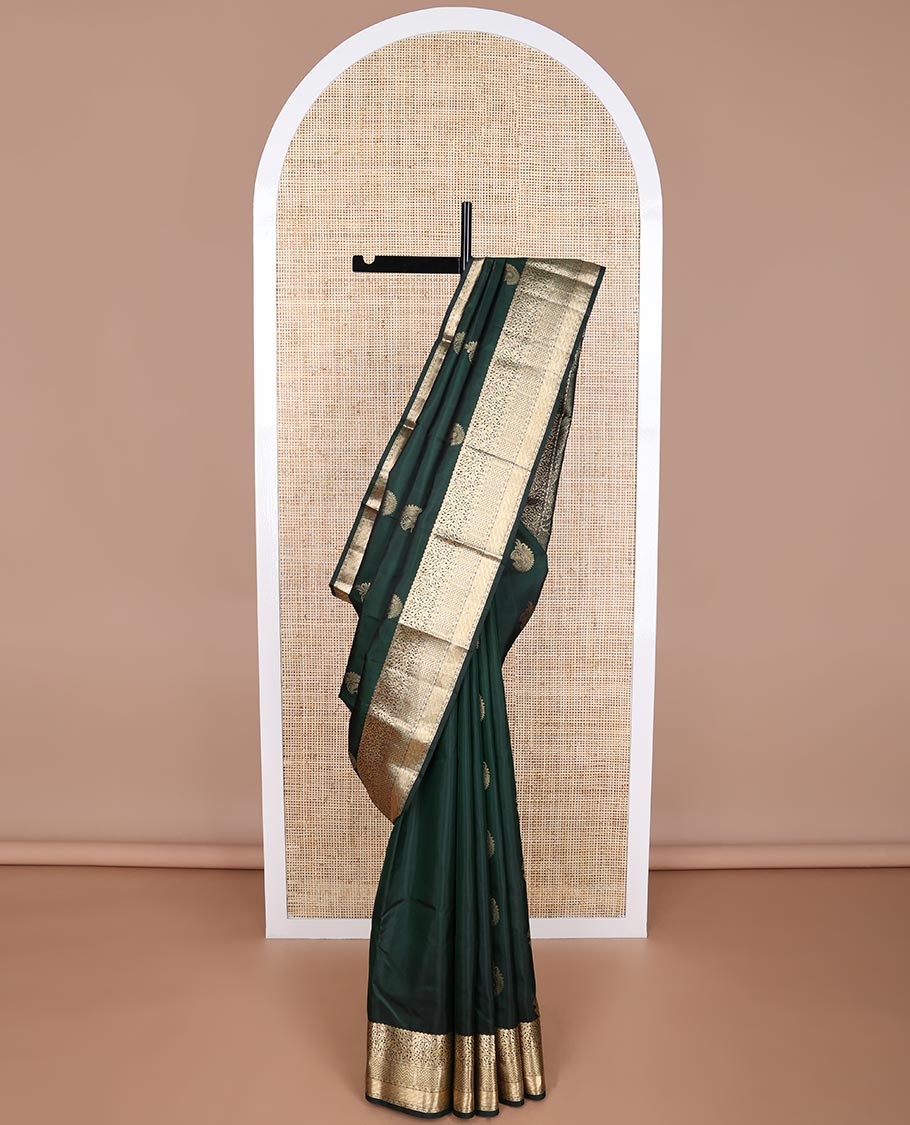 Bottle green leaf buttas silk saree with self floral design border & floral, paisley design pallu