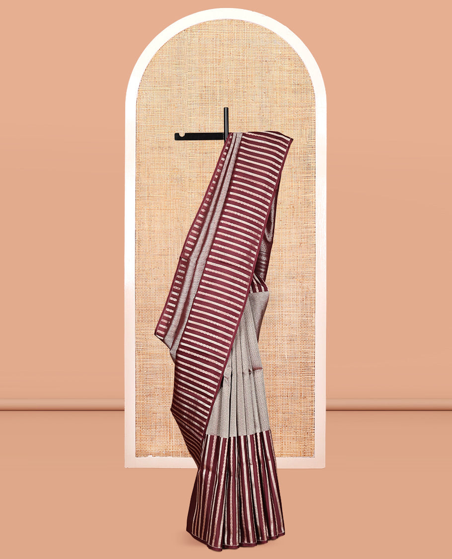 Borderless Brown Vasundhara Silk Saree, Detailed with Vanki and Zari Stripes, Highlighted by a Grand Pallu, and Matching Blouse