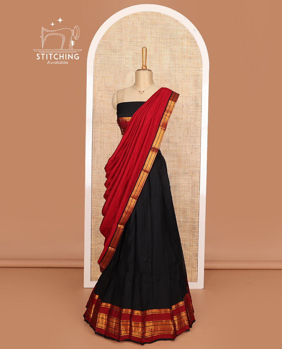 Black cotton half-saree, plain with contrast traditional zari bordered skirt, matching blouse, and contrast zari border dhavani