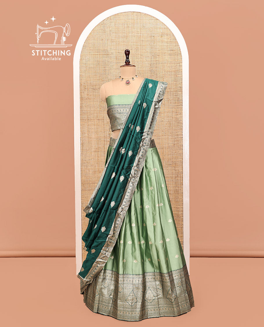 Green Art Silk Half Saree, Accentuated with Buttas Skirt, Contrast Traditional Border, Matching Blouse, and a Contrast Banaras Dhavani