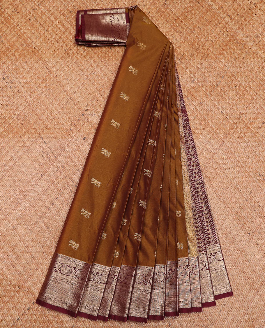 Brown Budget Silk Saree Elegantly Framed with Zari Buttas, Featuring a Contrast Traditional Zari-Design Border, Captivated with Mughal-Style Floral Butta Enclosed Arch Pallu, and a Contrast Blouse