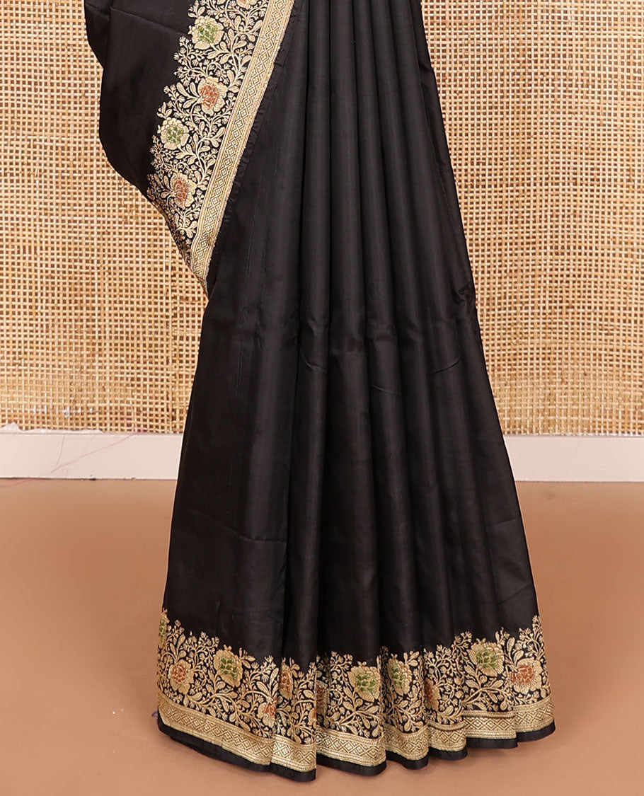 Black plain banarasi kathan silk saree, floral creeper meenakari border, and Mughal-style arches and floral design weave