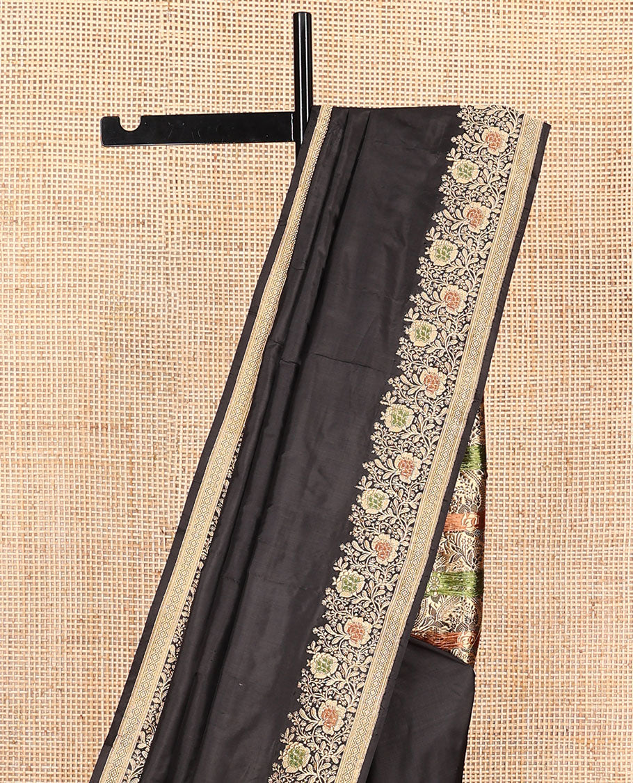 Black plain banarasi kathan silk saree, floral creeper meenakari border, and Mughal-style arches and floral design weave