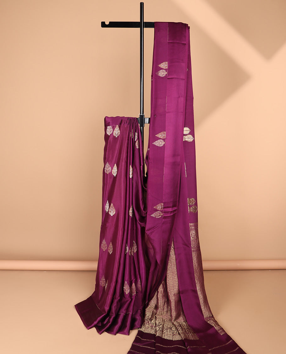 Dark pink leaf buttas crepe saree with self border & intricate zari design pallu