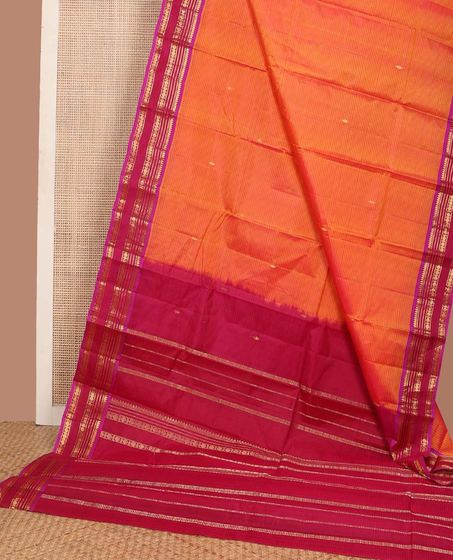 Orange striped and buttas Kanchipuram silk saree, contrast border and pallu of thilakam mokku, muthu, neli, and rudraksham designs
