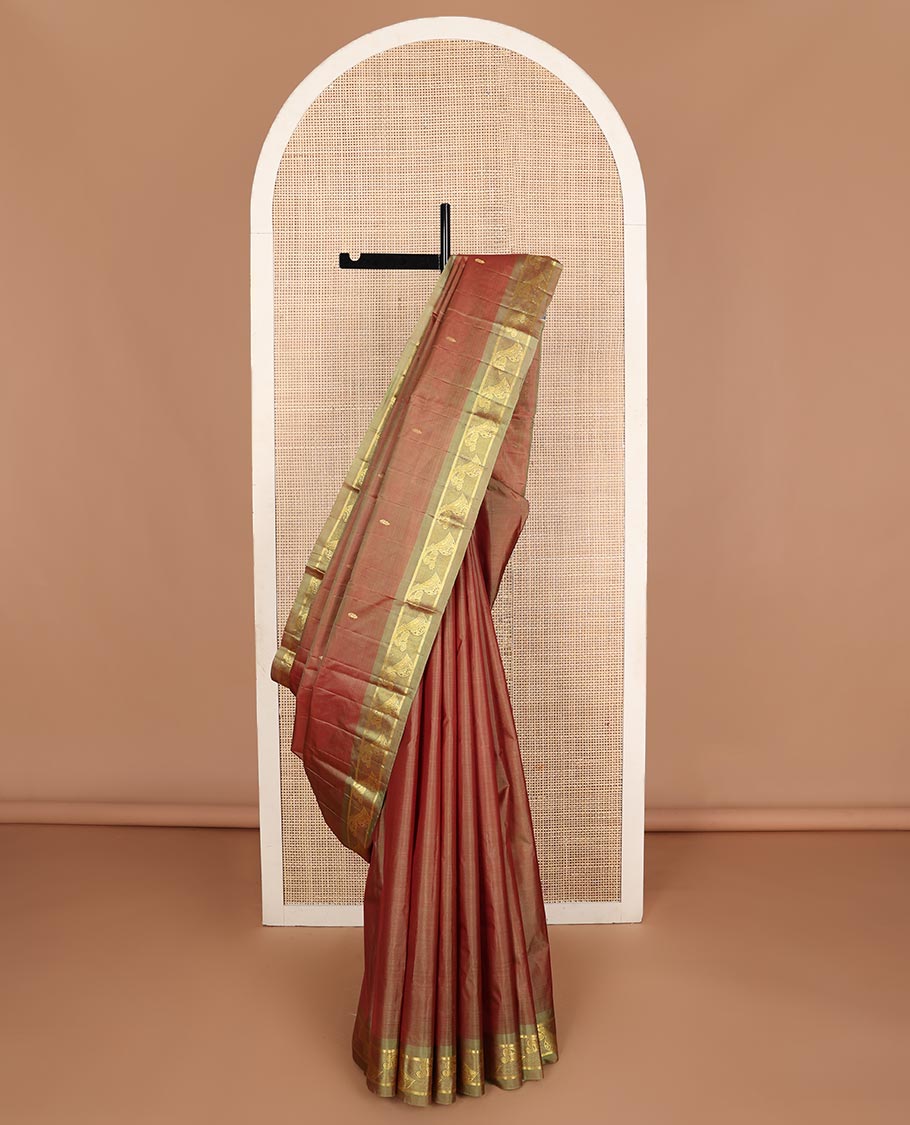 Brown zari buttas Kanchipuram silk saree, contrast instrumental theme, zari woven border of veena motifs, and zari design pallu