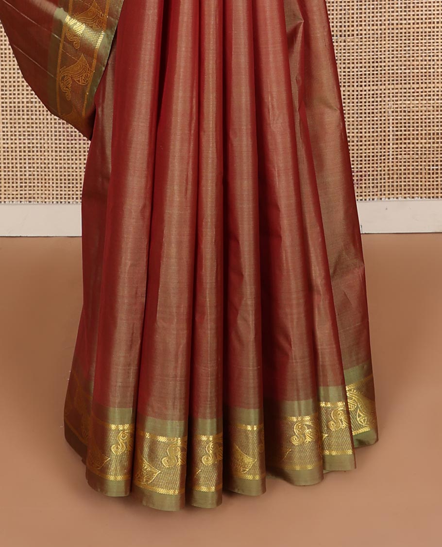 Brown zari buttas Kanchipuram silk saree, contrast instrumental theme, zari woven border of veena motifs, and zari design pallu