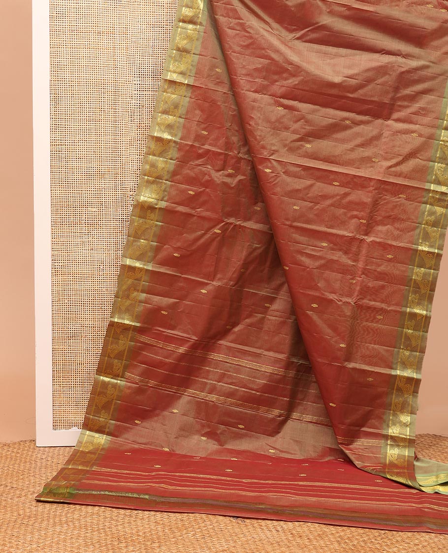 Brown zari buttas Kanchipuram silk saree, contrast instrumental theme, zari woven border of veena motifs, and zari design pallu