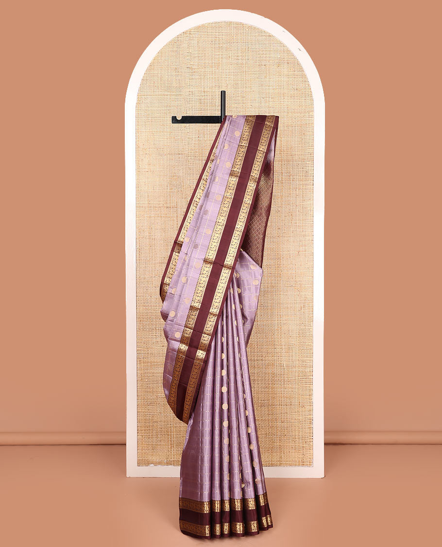 Lavender rudraksham butta enclosed checked soft silk saree, contrast rettai pettu border of rekku, muthu, banaras, and mayil designs, and jaal pallu