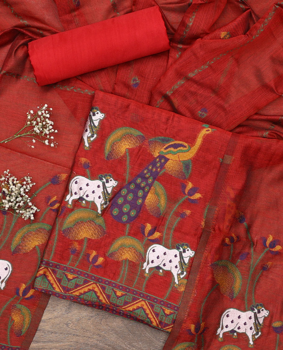 Orange material chudidar set, hand-painting style Pichwai lotus, cow and peacock printed top, plain bottom and dupatta mirrors the same top print