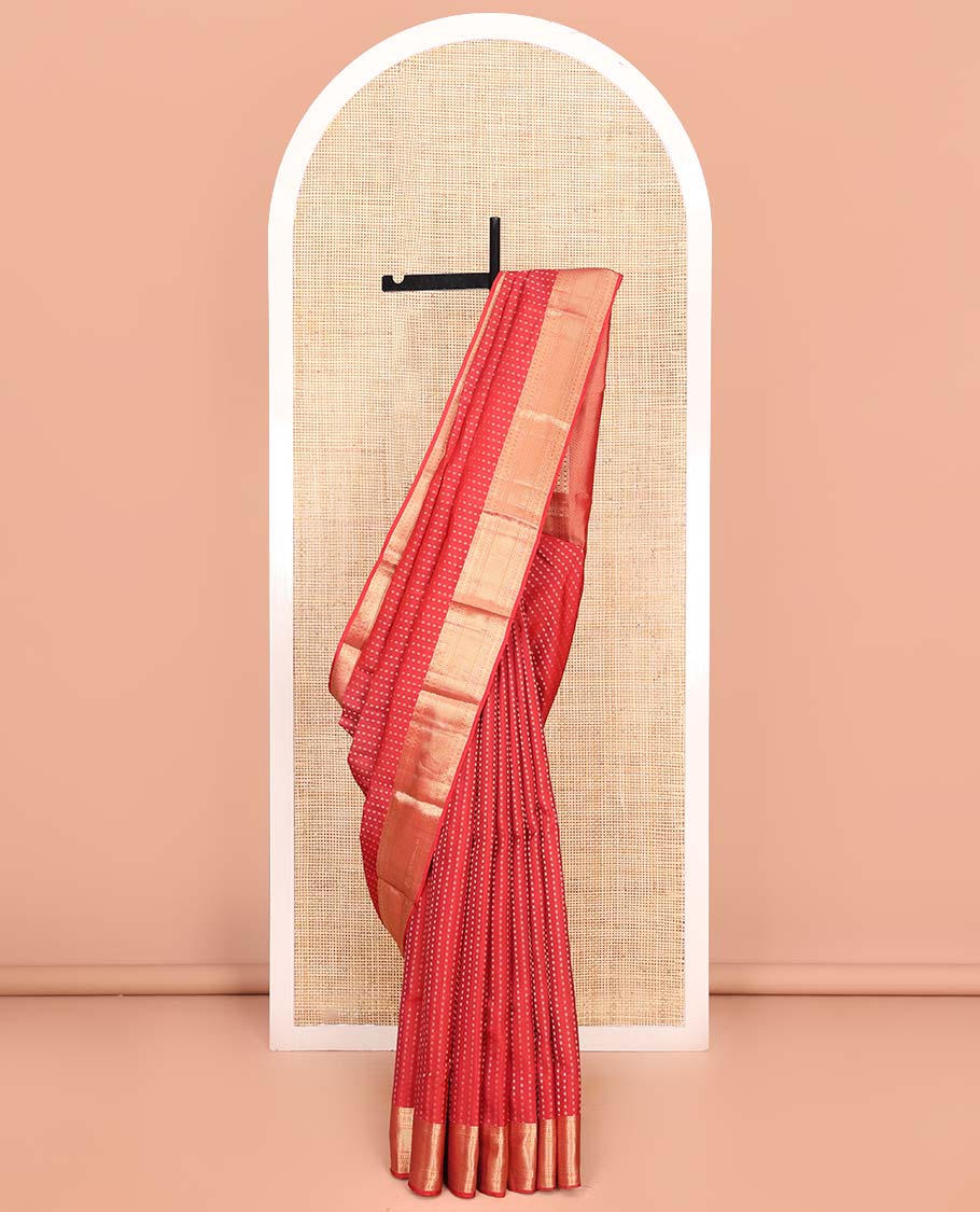 Red Vasundhara Lite Silk Mix Saree, Adorned with Zari Buttas All Over Its Body, Highlighted by Zari Border of Rudraksham, Banaras, Manga, and Mayil Kann Designs, Diagonally Striped Pallu, and Paired with a Matching Blouse