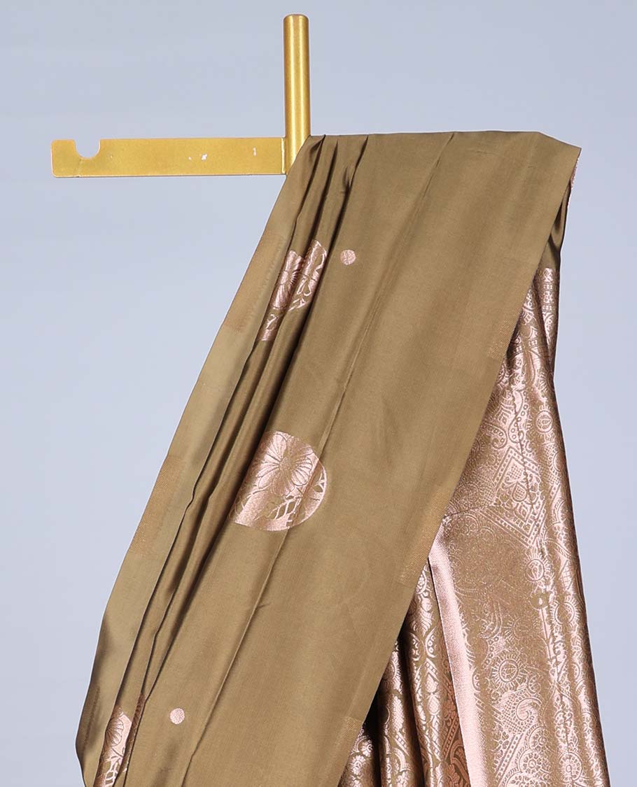 Borderless dark mustard butter silk saree with zari buttas, zari-rich intricately designed pallu
