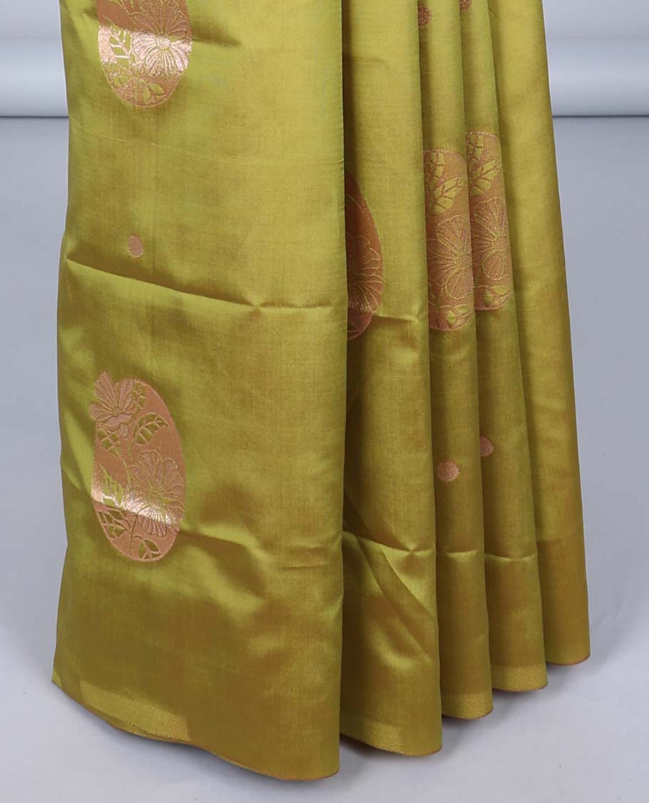 Borderless green butter silk saree with zari buttas, zari-rich intricately designed pallu