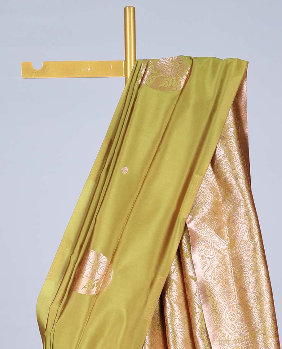 Borderless green butter silk saree with zari buttas, zari-rich intricately designed pallu