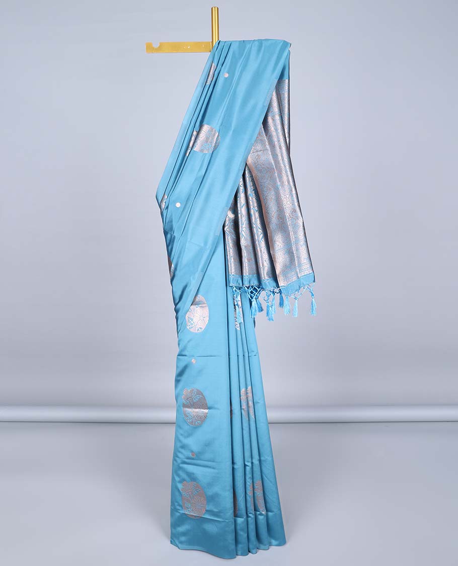 Borderless blue butter silk saree with zari buttas, zari-rich intricately designed pallu