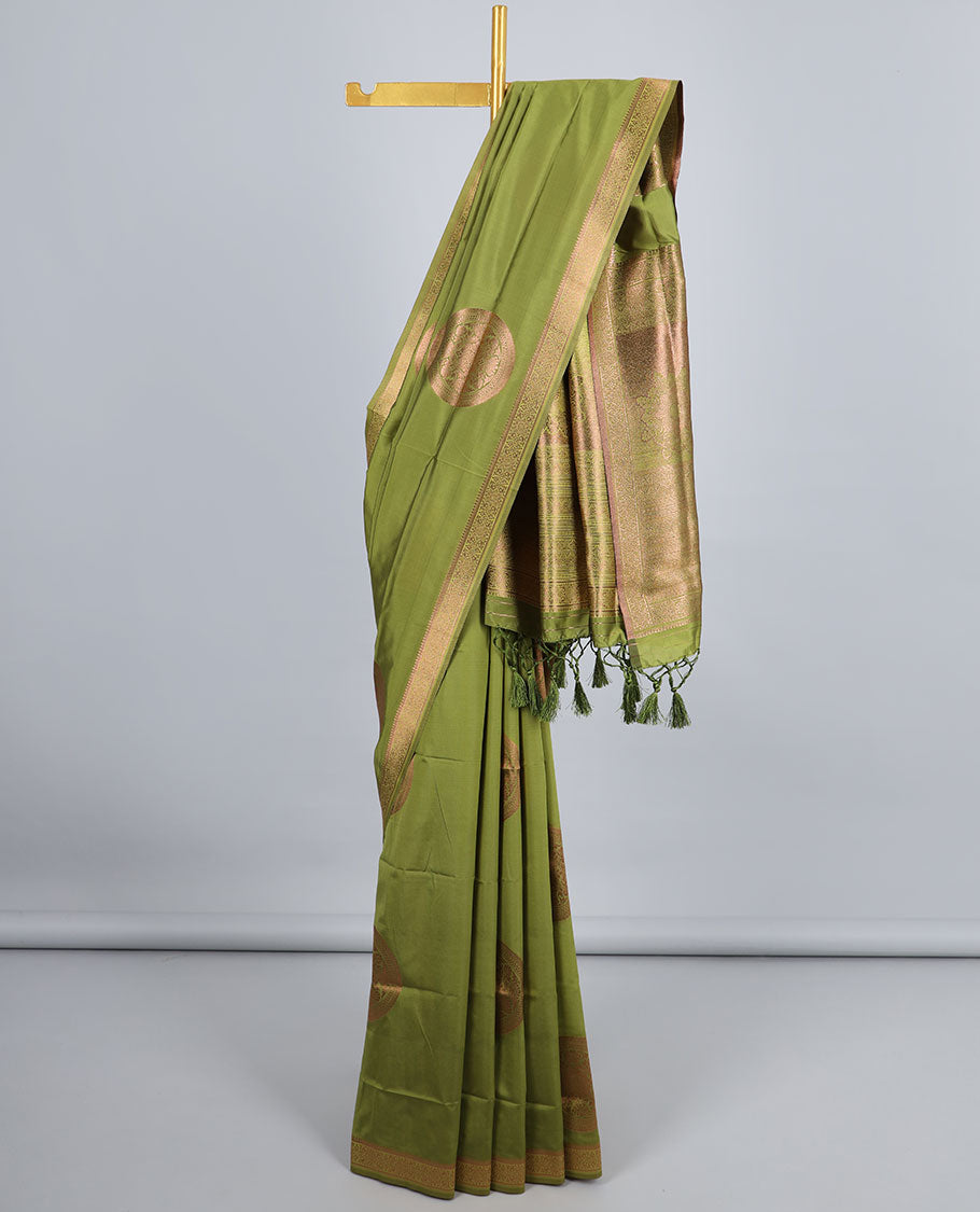 Green butter silk saree with chakram zari buttas, zari border & self-pallu of traditional designs