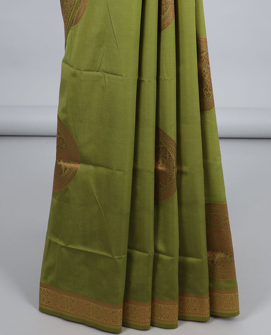 Green butter silk saree with chakram zari buttas, zari border & self-pallu of traditional designs