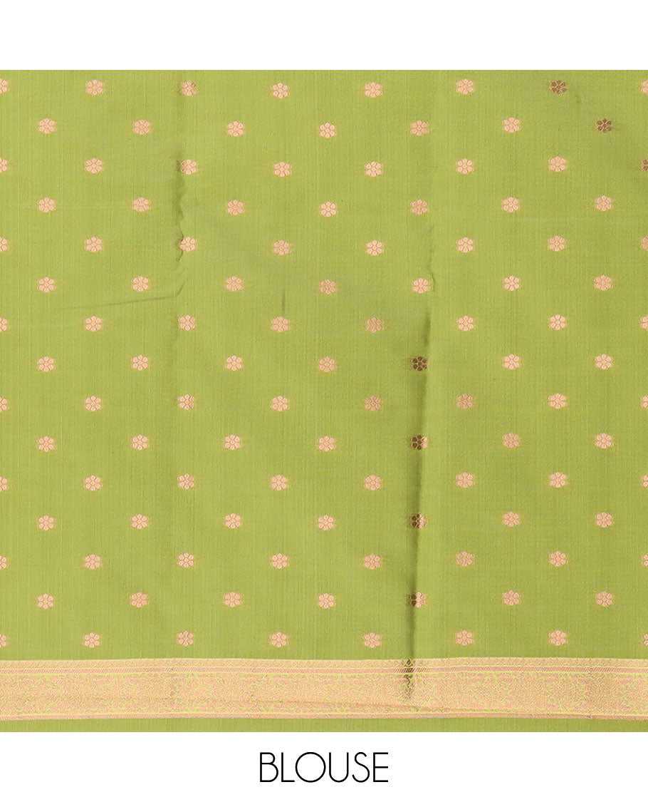 Green butter silk saree with chakram zari buttas, zari border & self-pallu of traditional designs
