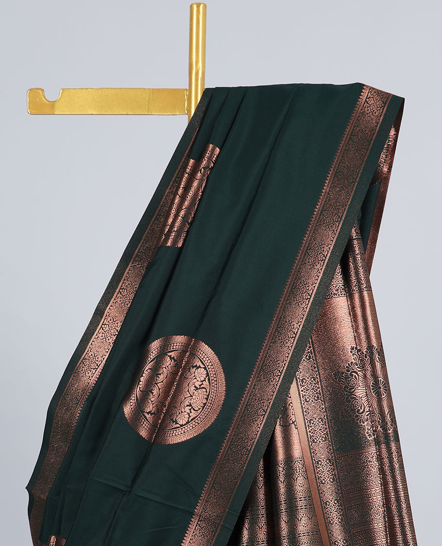 Green butter silk saree with chakram zari buttas, zari border & self-pallu of traditional designs