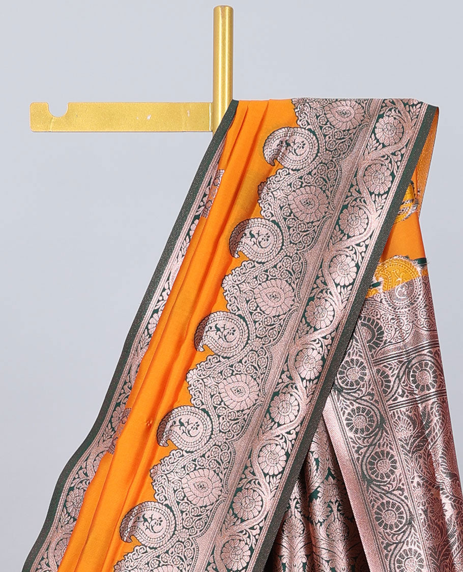 Orange butter silk saree with zari buttas, contrast zari border of paisley & floral creeper & intricate pallu