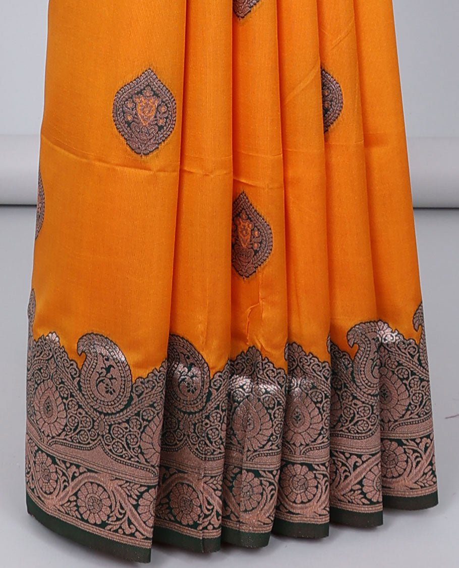 Orange butter silk saree with zari buttas, contrast zari border of paisley & floral creeper & intricate pallu