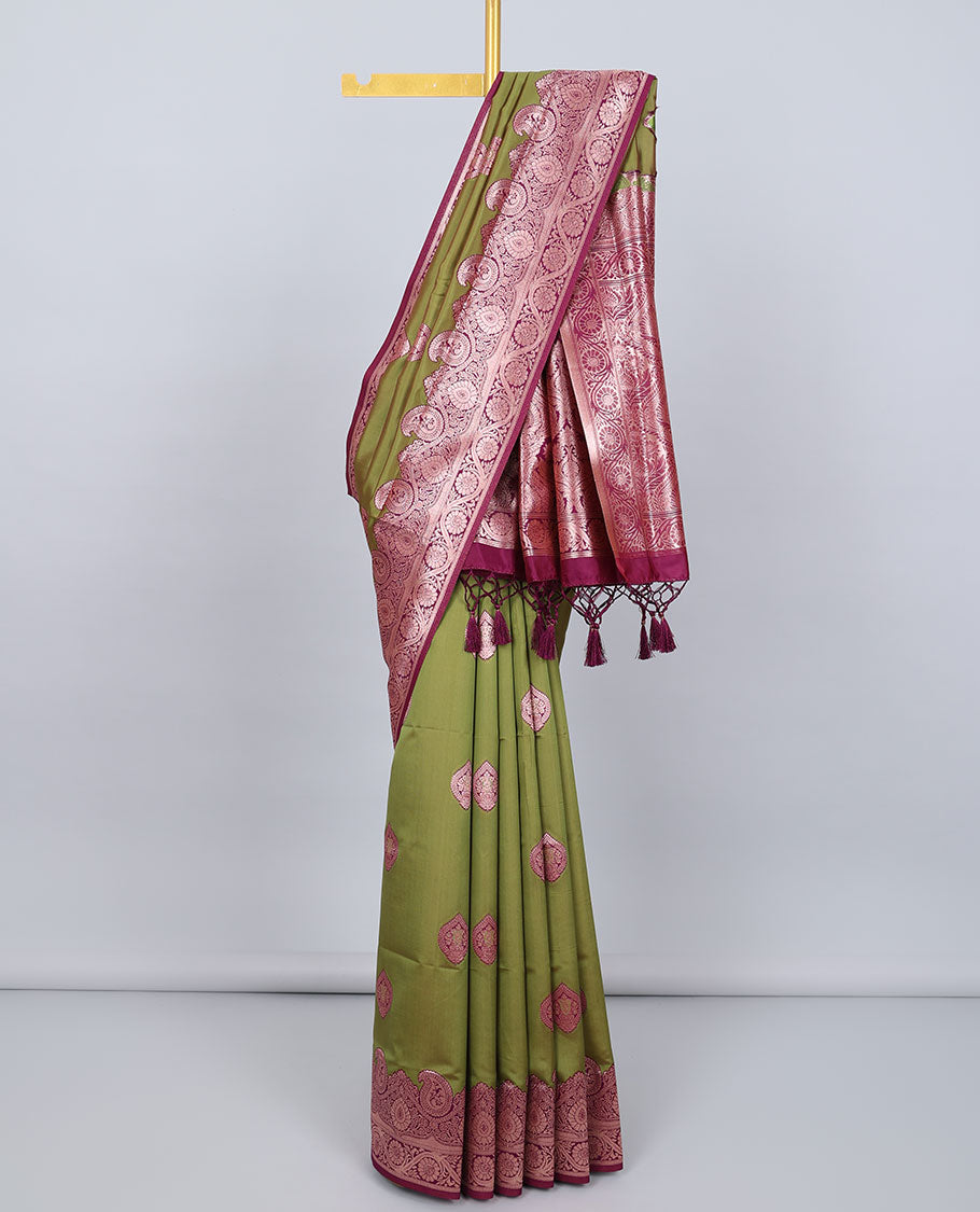 Green butter silk saree with zari buttas, contrast zari border of paisley & floral creeper & intricate pallu